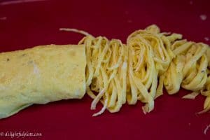 Bun thang egg strips