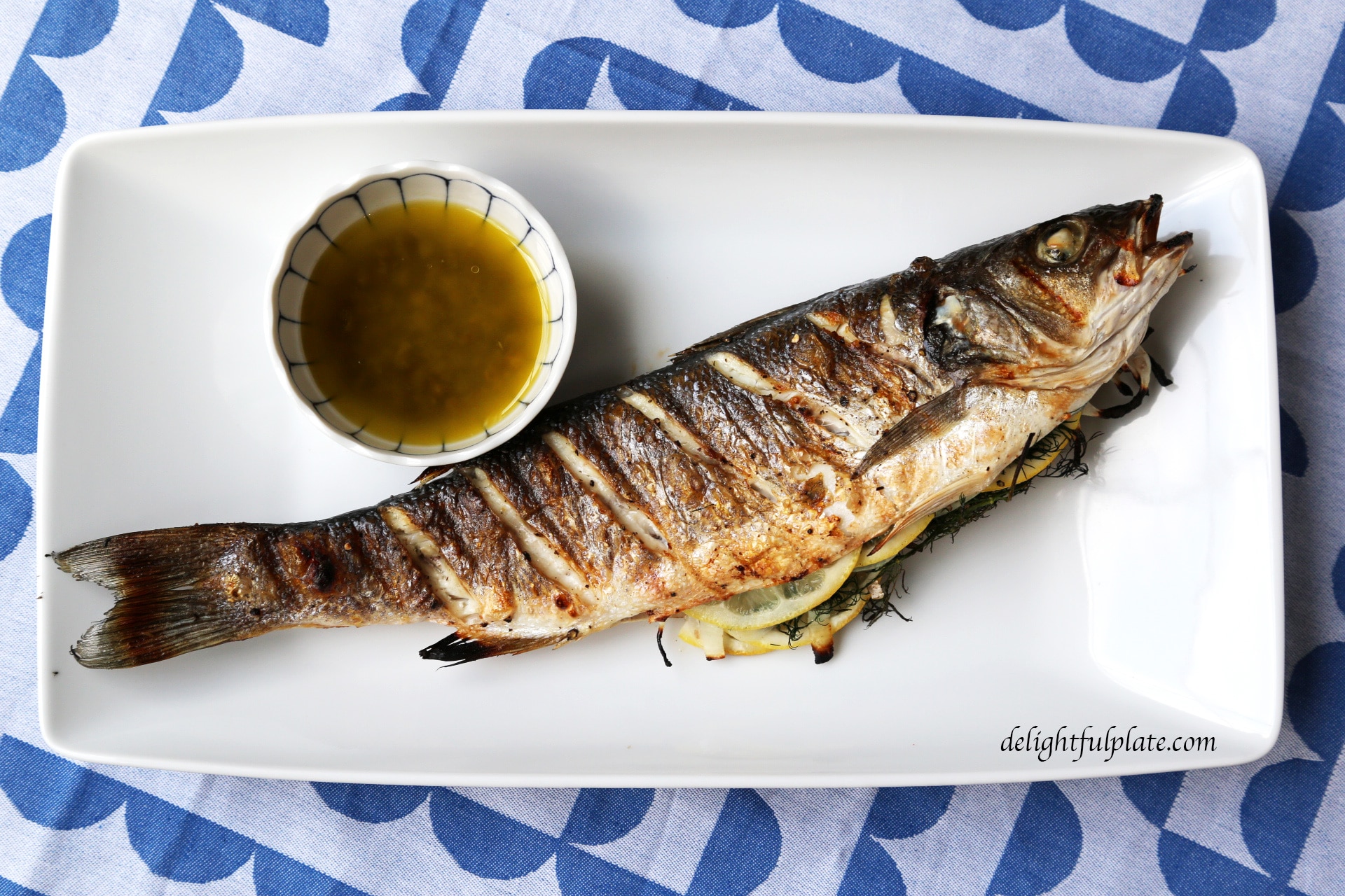 Grilled whole branzino lemon caper sauce
