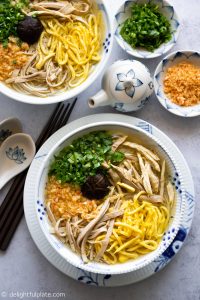 Vietnamese Bun Thang is an iconic chicken noodle soup of Hanoi. This delicious and colorful dish features a light and flavorful broth and a lot of toppings with different textures.