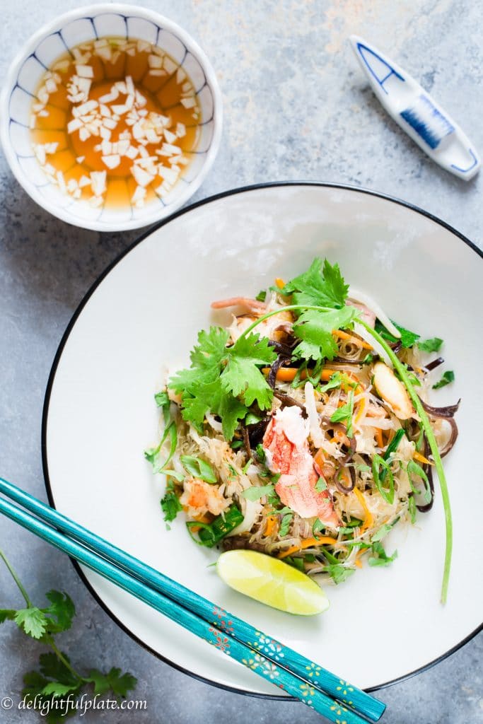 Crab Cellophane Noodles is a traditional Vietnamese dish. The dish is incredibly delicious with the natural sweetness of crab meat, soft translucent noodles, crunchy vegetables, and refreshing lime fish sauce dressing.
