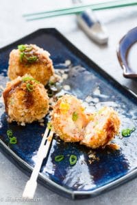 These baked shrimp corn cakes are tasty appetizers which require a handful of simple ingredients and easy cooking steps. They are crispy, and the baking method makes them guilt-free.