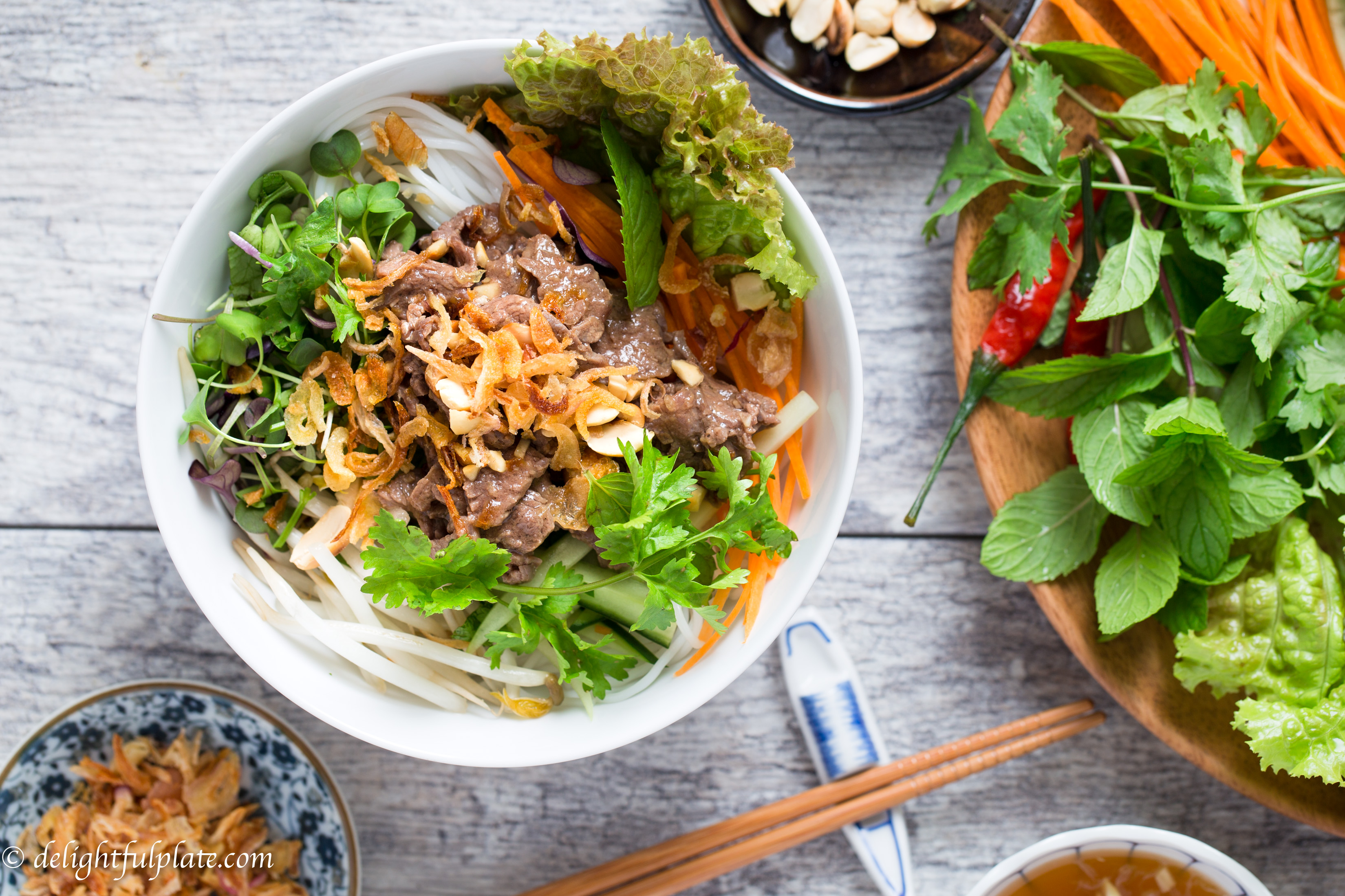 Vietnamese Beef Noodle Salad (Bun Bo Xao) is very tasty with flavorful beef, fresh herbs and veggies. It is quick and easy to make, and can be either a main or side dish.