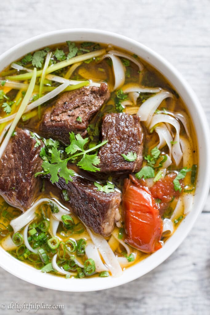 Vietnamese beef stew pho noodle soup (Pho bo sot vang) is a hearty and comforting noodle soup. This noodle soup features tender beef, flavorful broth and amazing aroma from pho spices.