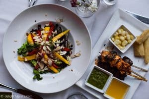 Salad and grilled skewers at Mango restaurant, St. Louis