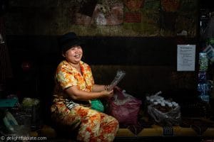A smiling lady at a local market in Siem Reap