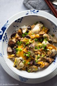 This Mushroom Oyster Rice Bowl (Oyster Donburi) features sweet and plump oysters and earthy shiitake mushrooms, simmered in an umami sauce and then served with fluffy steamed rice. A delicious, easy and healthy one-bowl meal that comes together in less than 30 minutes.