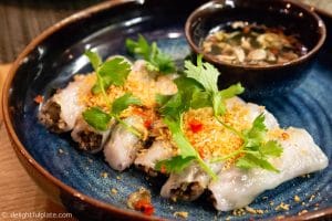 Vietnamese steamed rice rolls with fillings (banh cuon nhan)