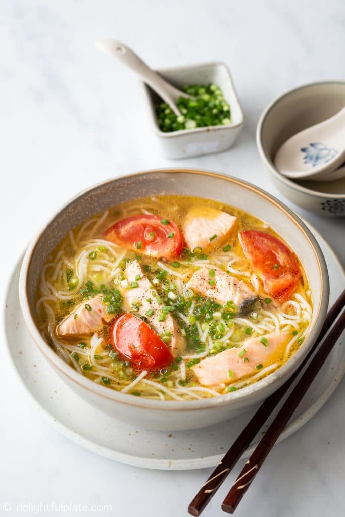 A bowl of salmon noodle soup with vermicelli noodles, salmon chunks and a Vietnamese style broth. Quick and easy to make.