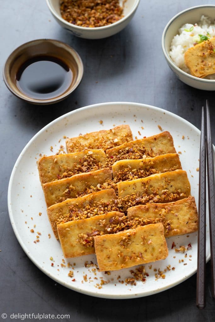 Vietnamese Lemongrass Chili Tofu (Dau Hu Chien Sa Ot) is a vegan dish with crispy fried tofu marinated with lemongrass and bird's eye chili.