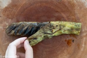 Peeling grilled eggplant