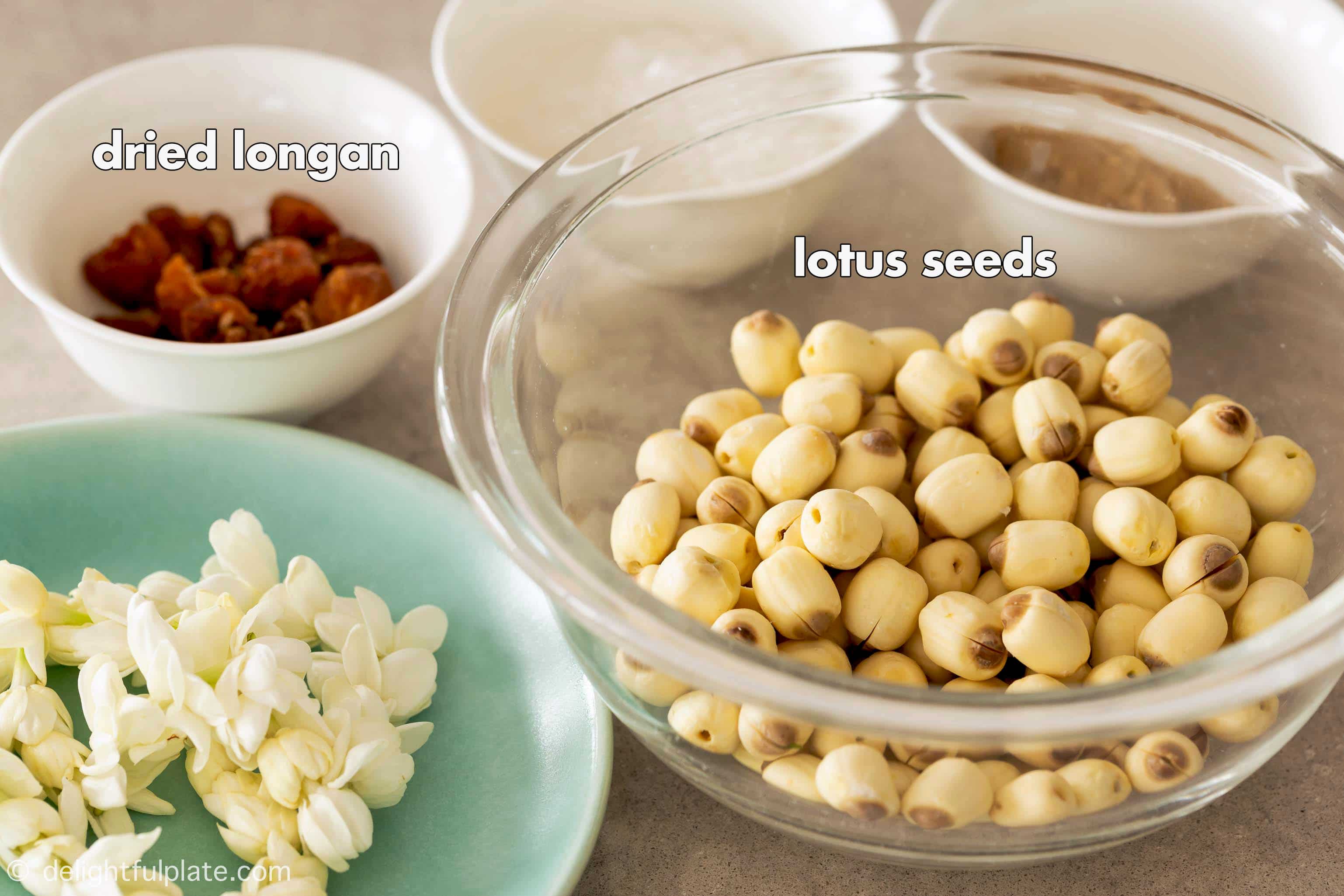 prepping bowls containing lotus seeds, dried longan, rock sugar and light brown sugar