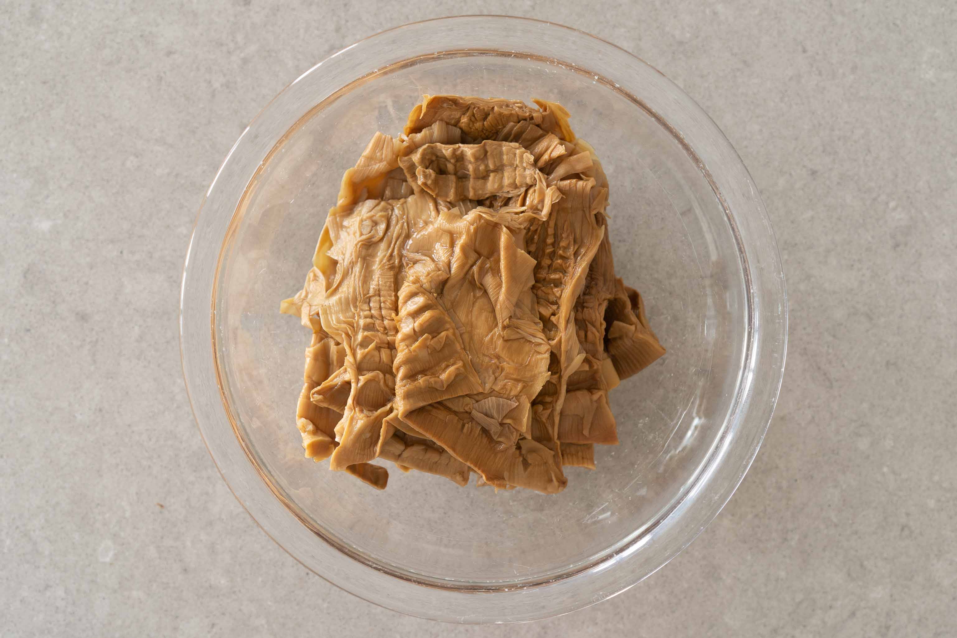 a bowl of soaked dried bamboo shoots