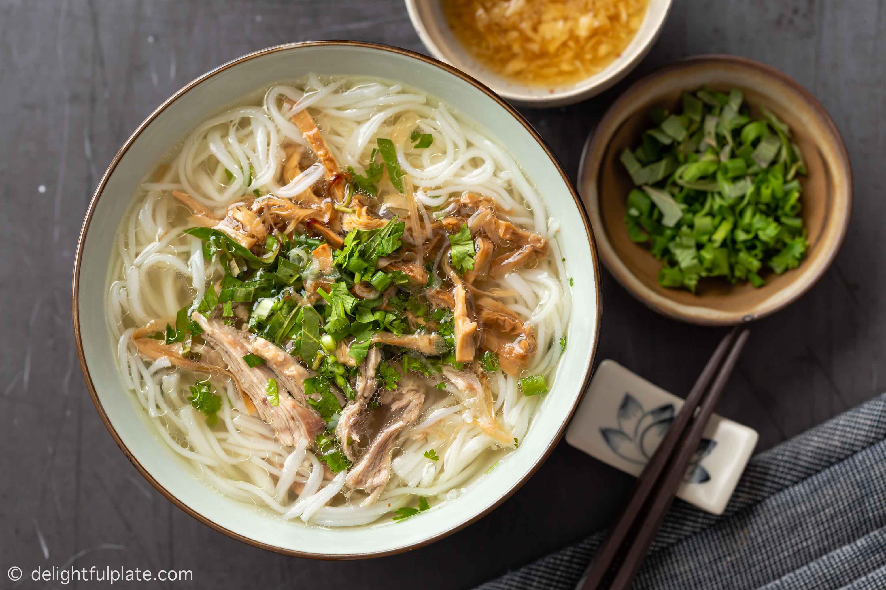 a bowl of Vietnamese duck and bamboo shoot noodle soup