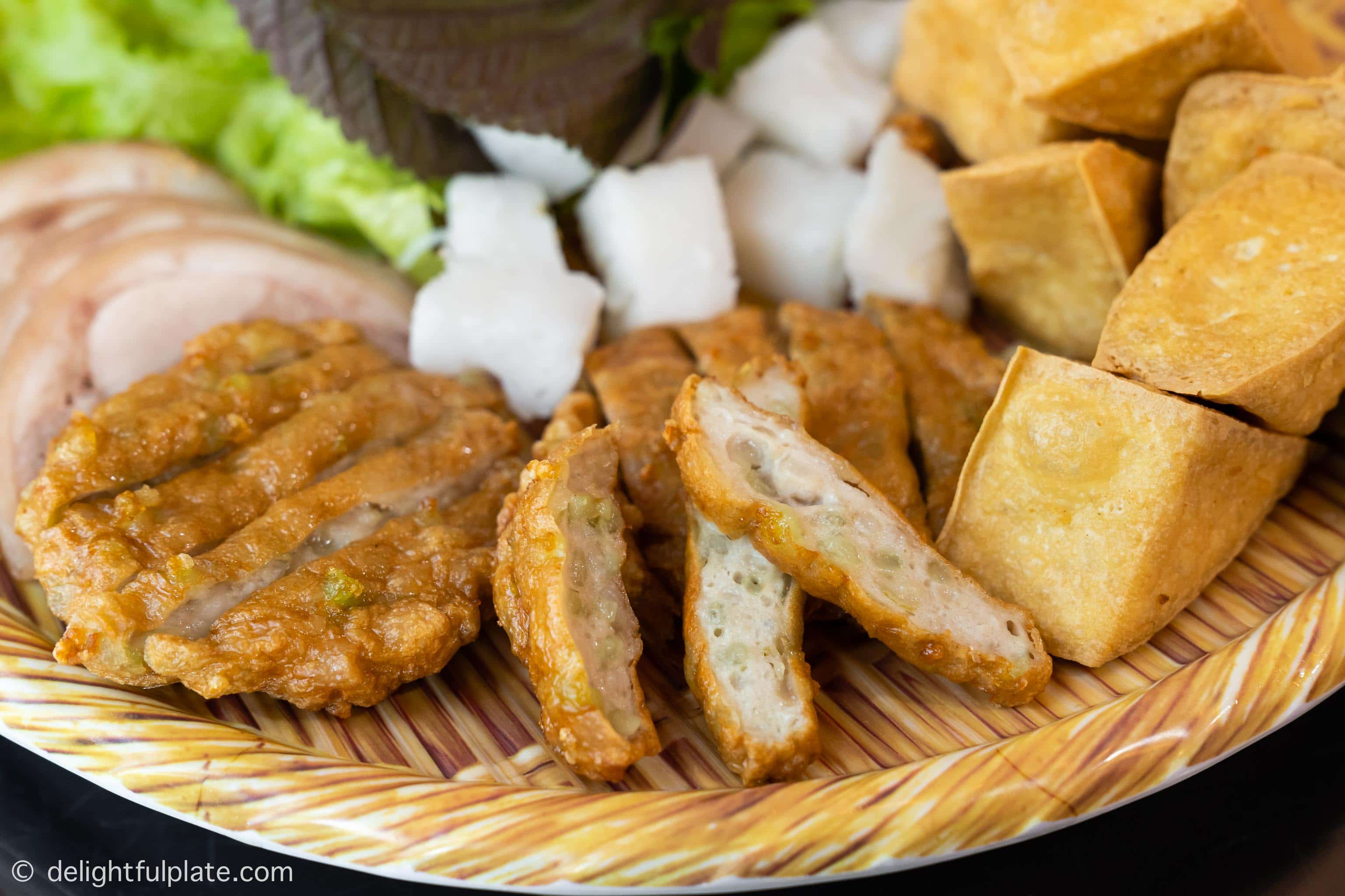 A platter of chả cốm, fried tofu and vermicelli noodles