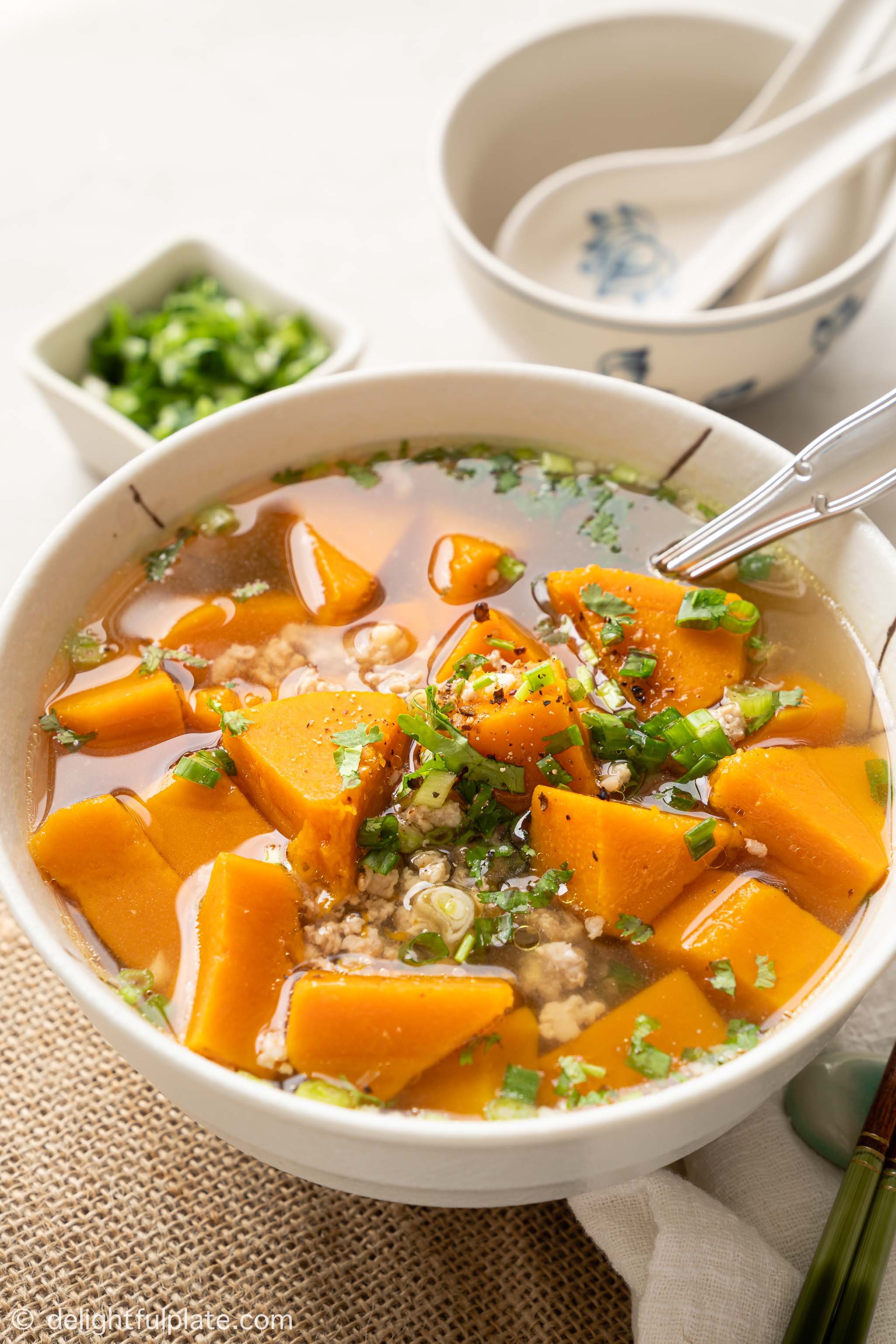 a bowl of Vietnamese butternut squash soup (canh bi do)