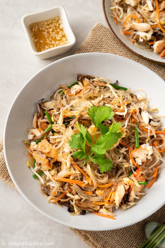 a plate of Vietnamese crab glass noodles stir-fry (Mien Xao Cua)