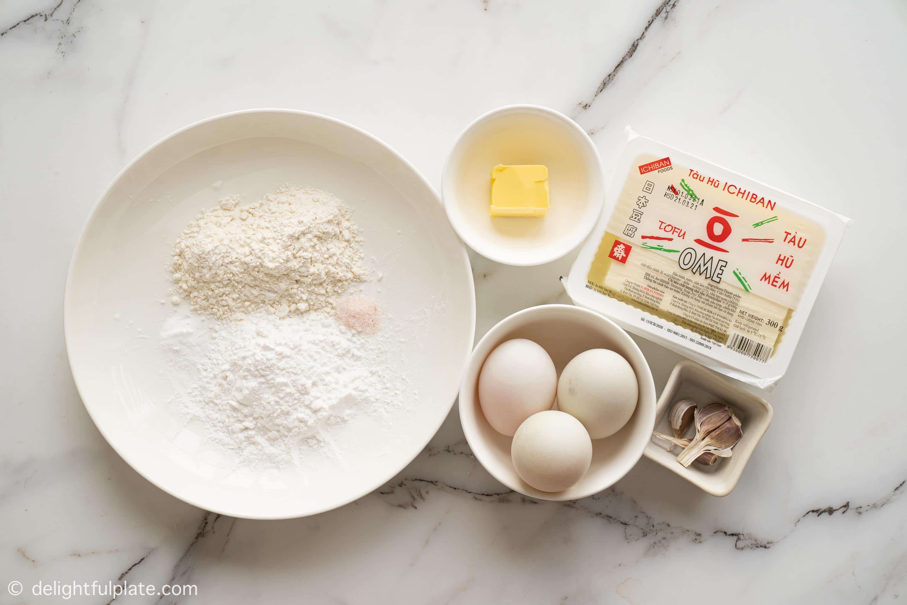 plates with ingredients for this tofu in salted egg sauce recipe