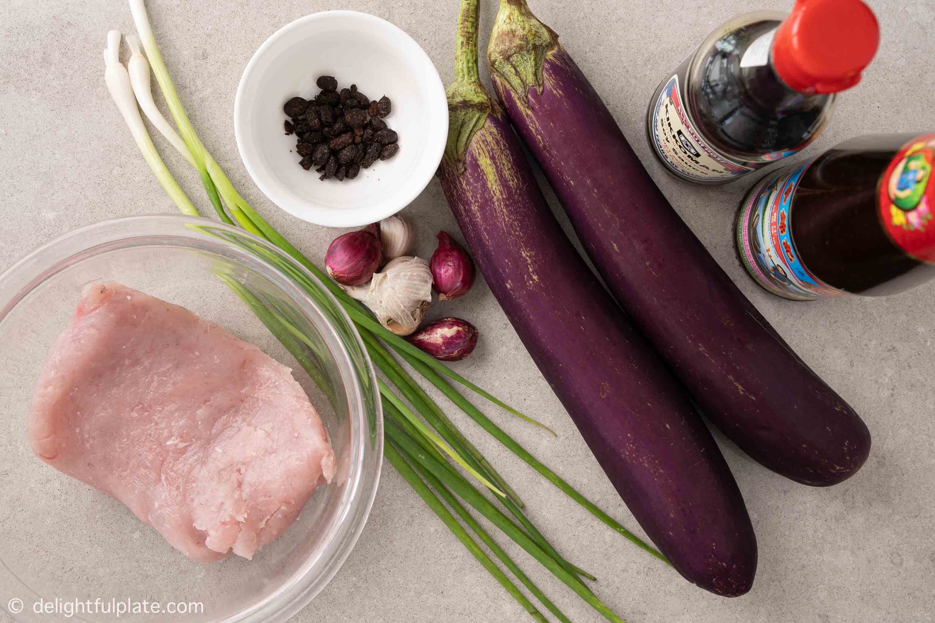 bowls containing ingredients for Asian stuffed eggplant