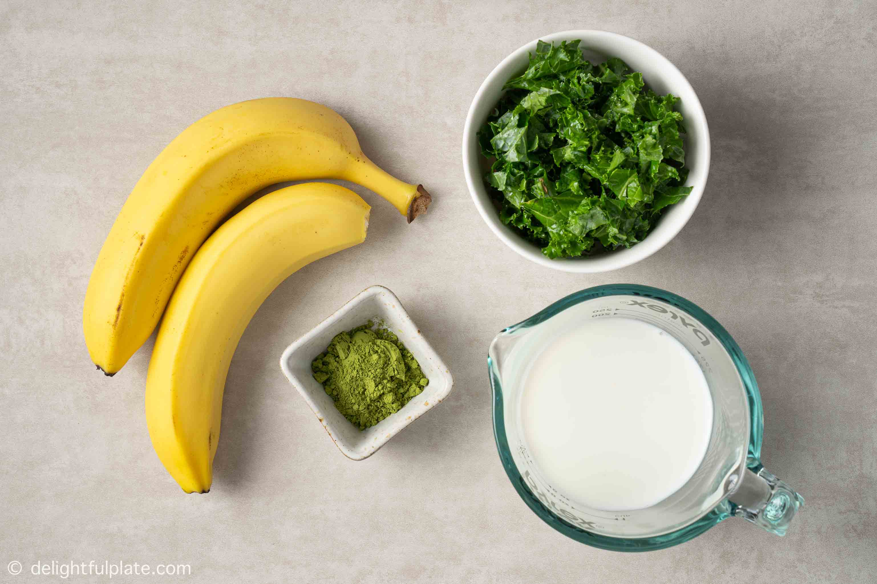 bowls containing ingredients for the smoothie