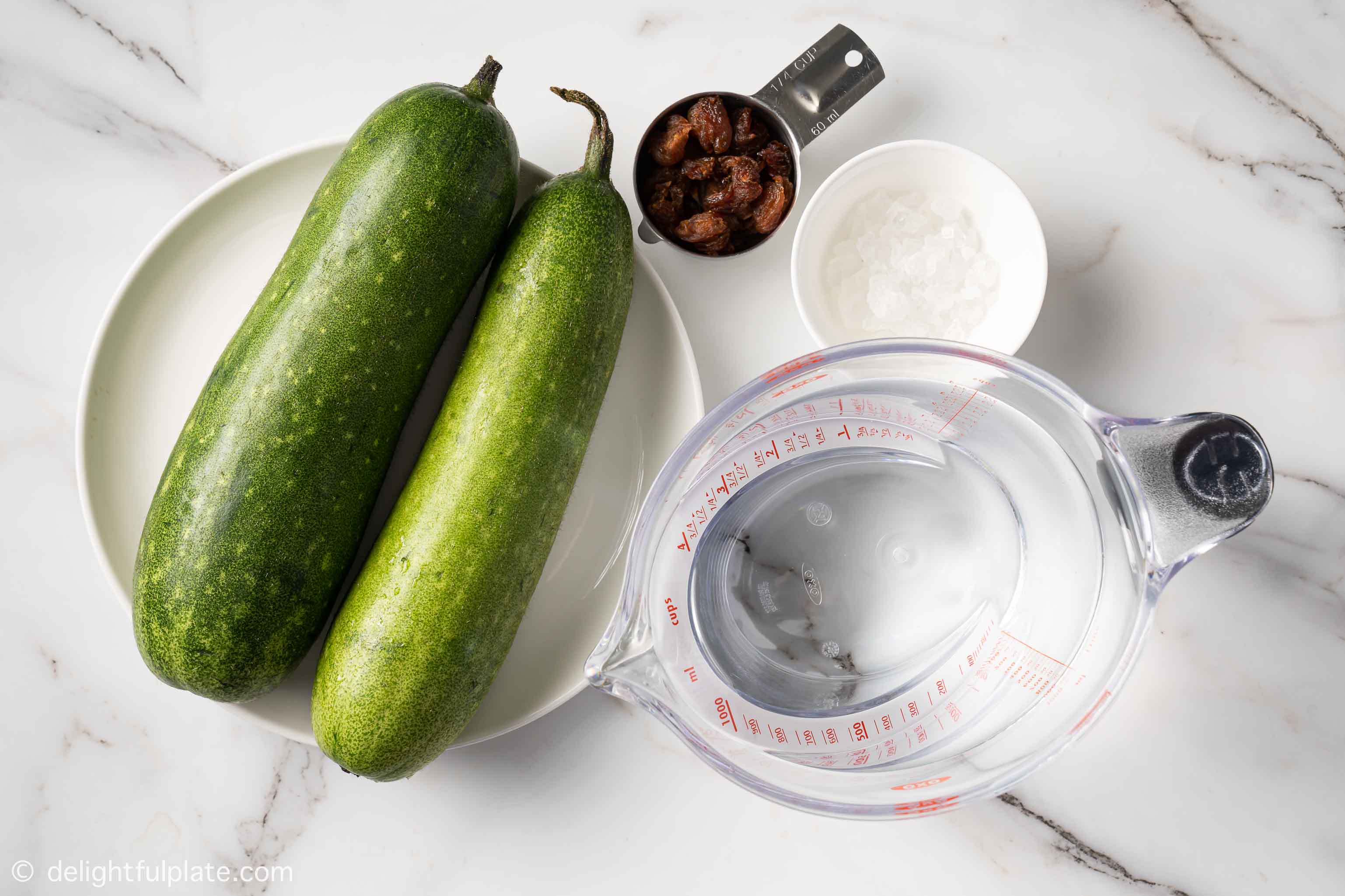 plates containing ingredients for winter melon tea