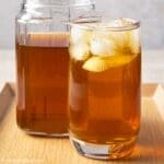 a glass and a jug of winter melon tea