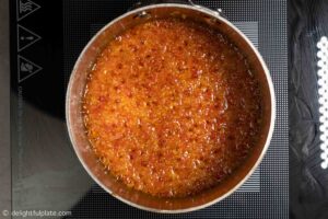 cook chilis and aromatics in oil