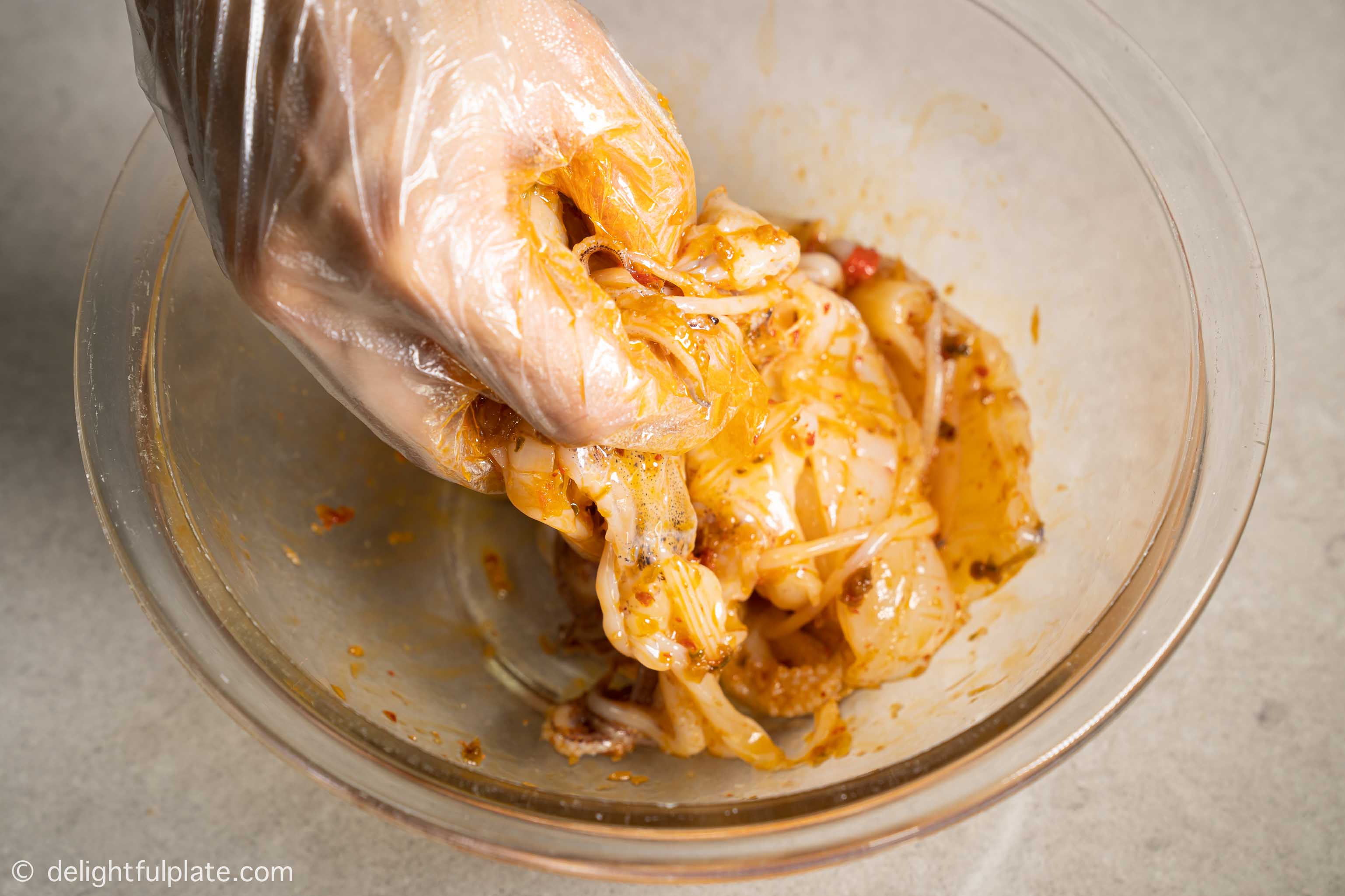 tossing squid with sate sauce