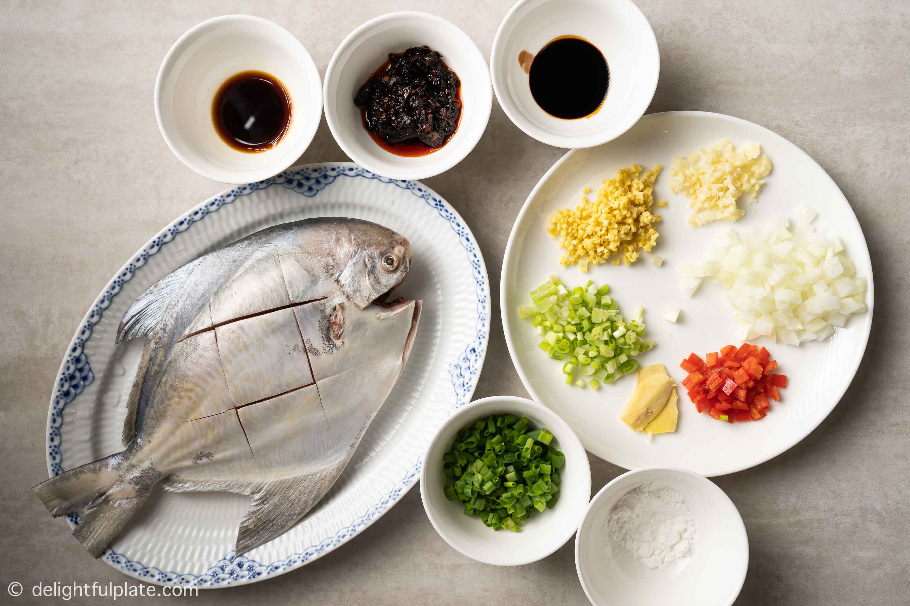 plates with ingredients for the dish