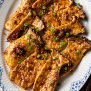 a plate of grilled king trumpet mushrooms