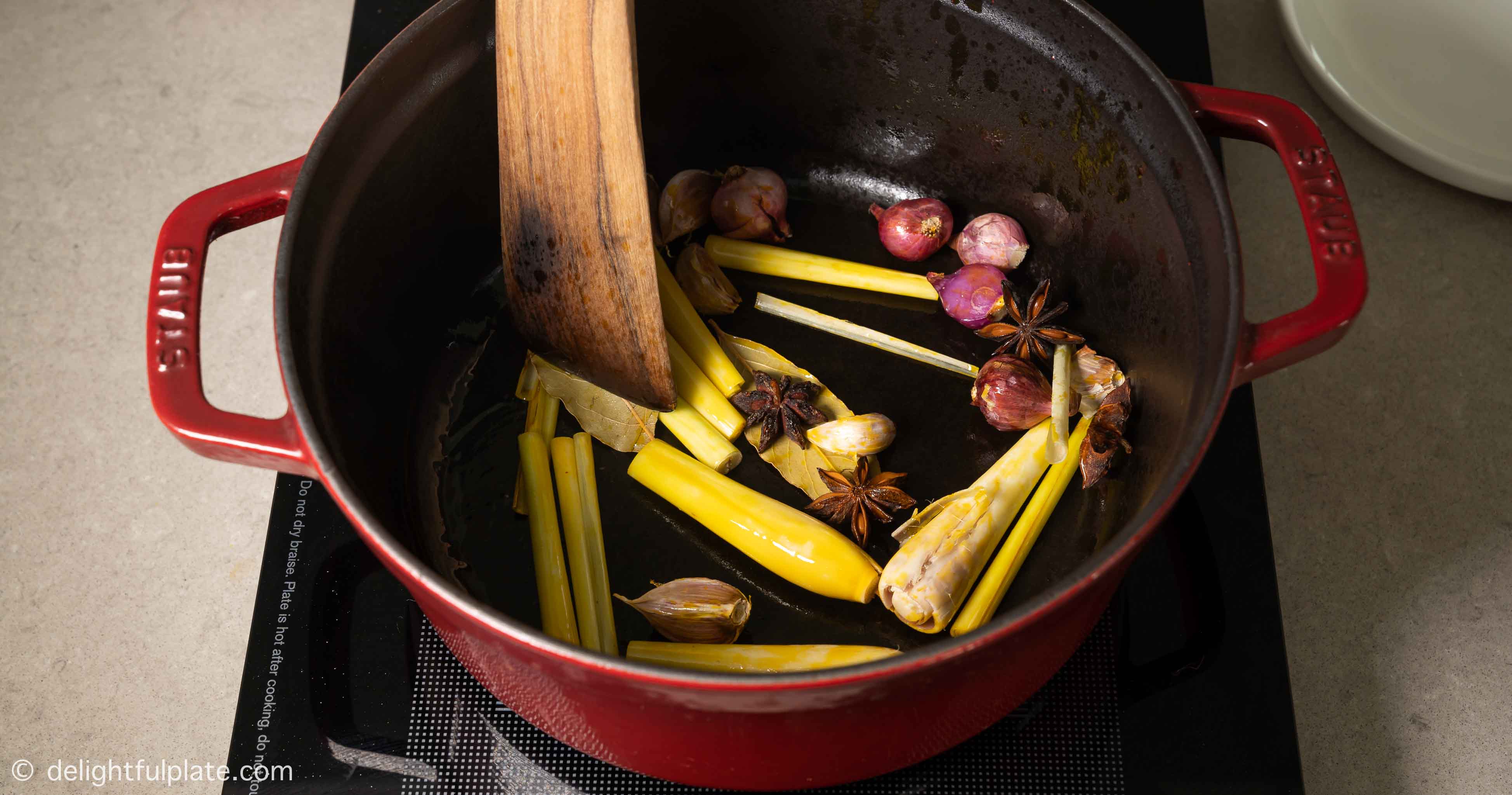 saute aromatics in a pot