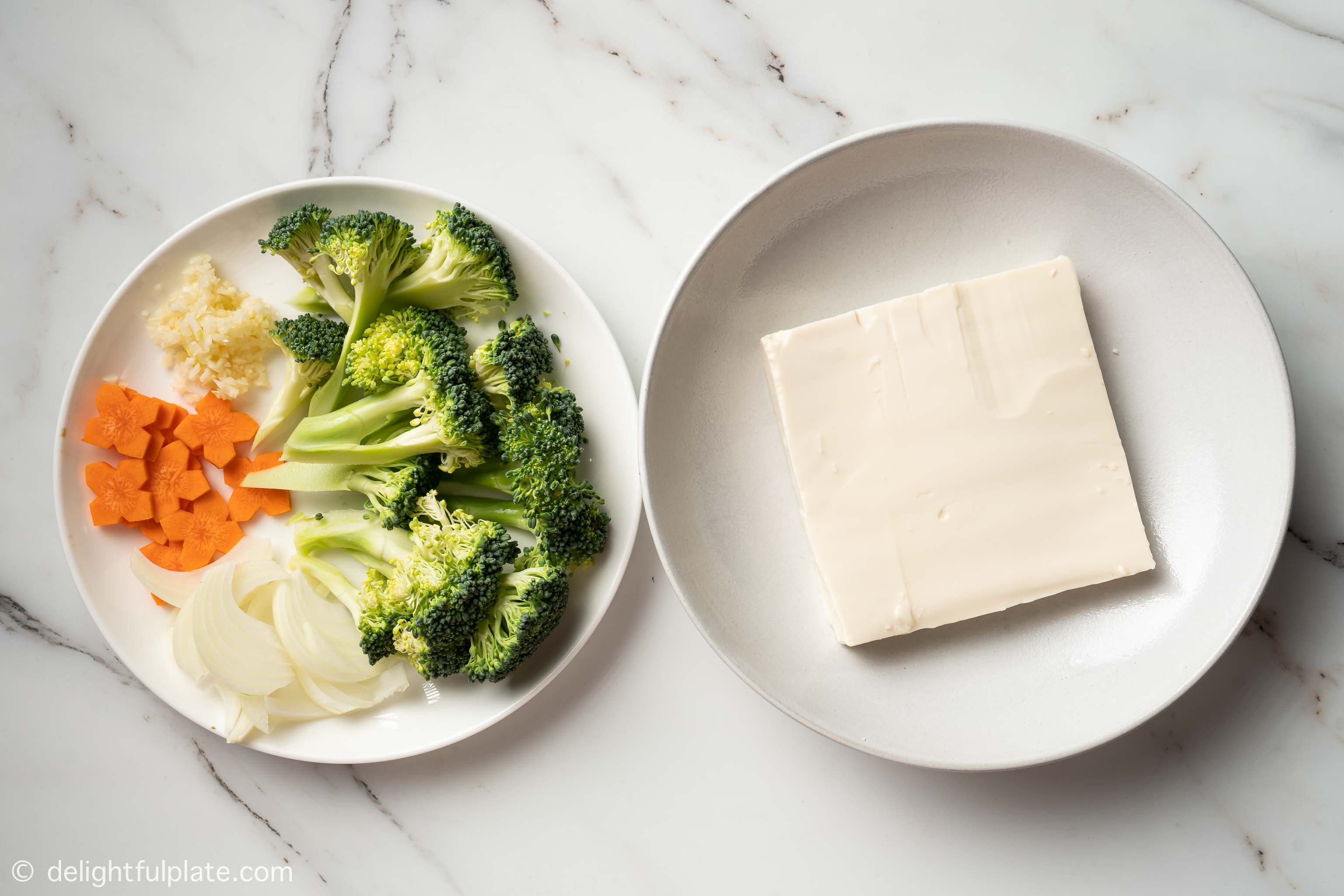 plates containing silken tofu and vegetables