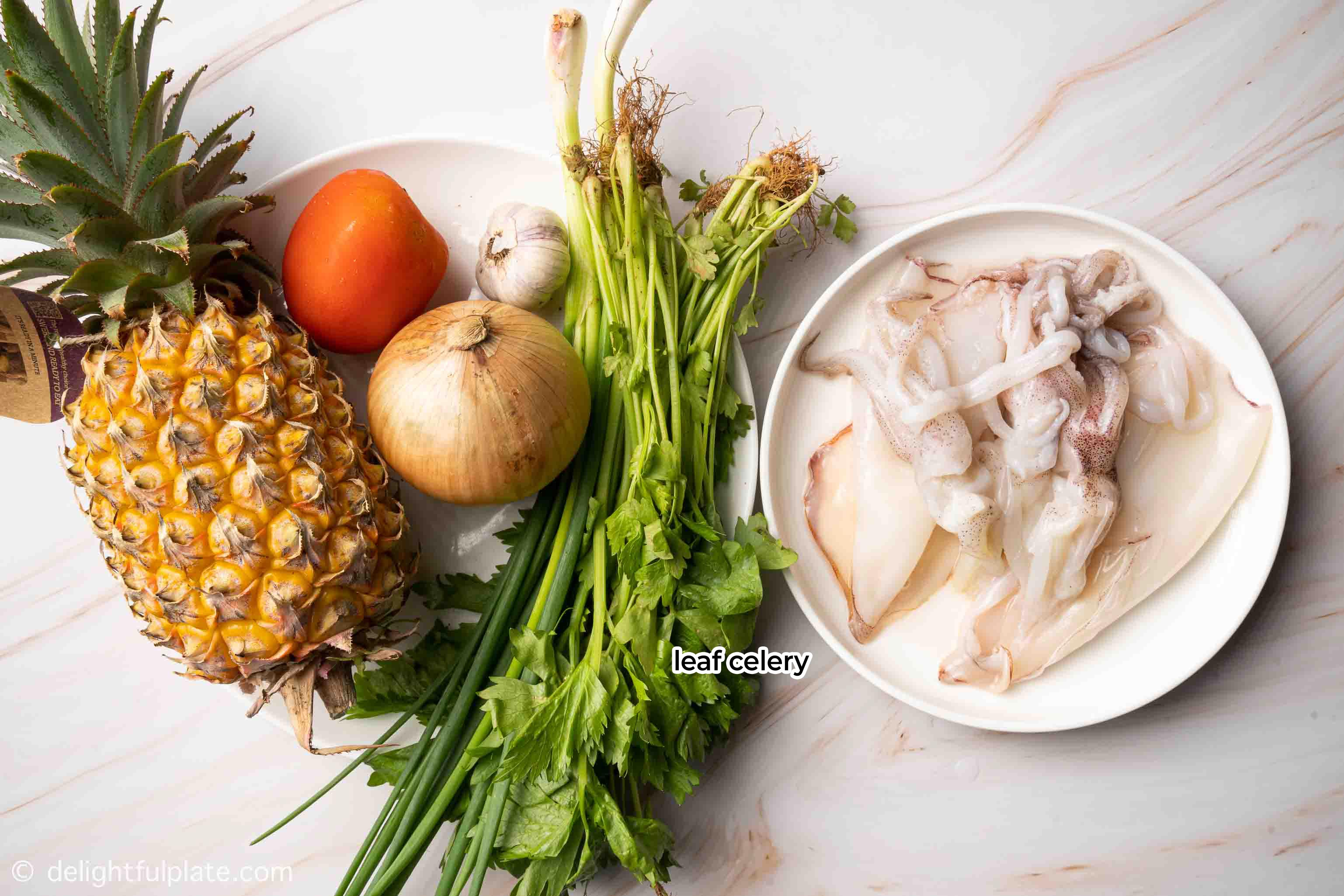 plates containing ingredients for the recipe