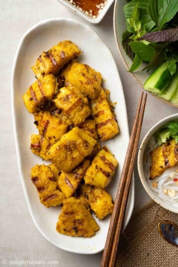 a plate of Vietnamese grilled fish