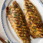 a plate of grilled saba fillets