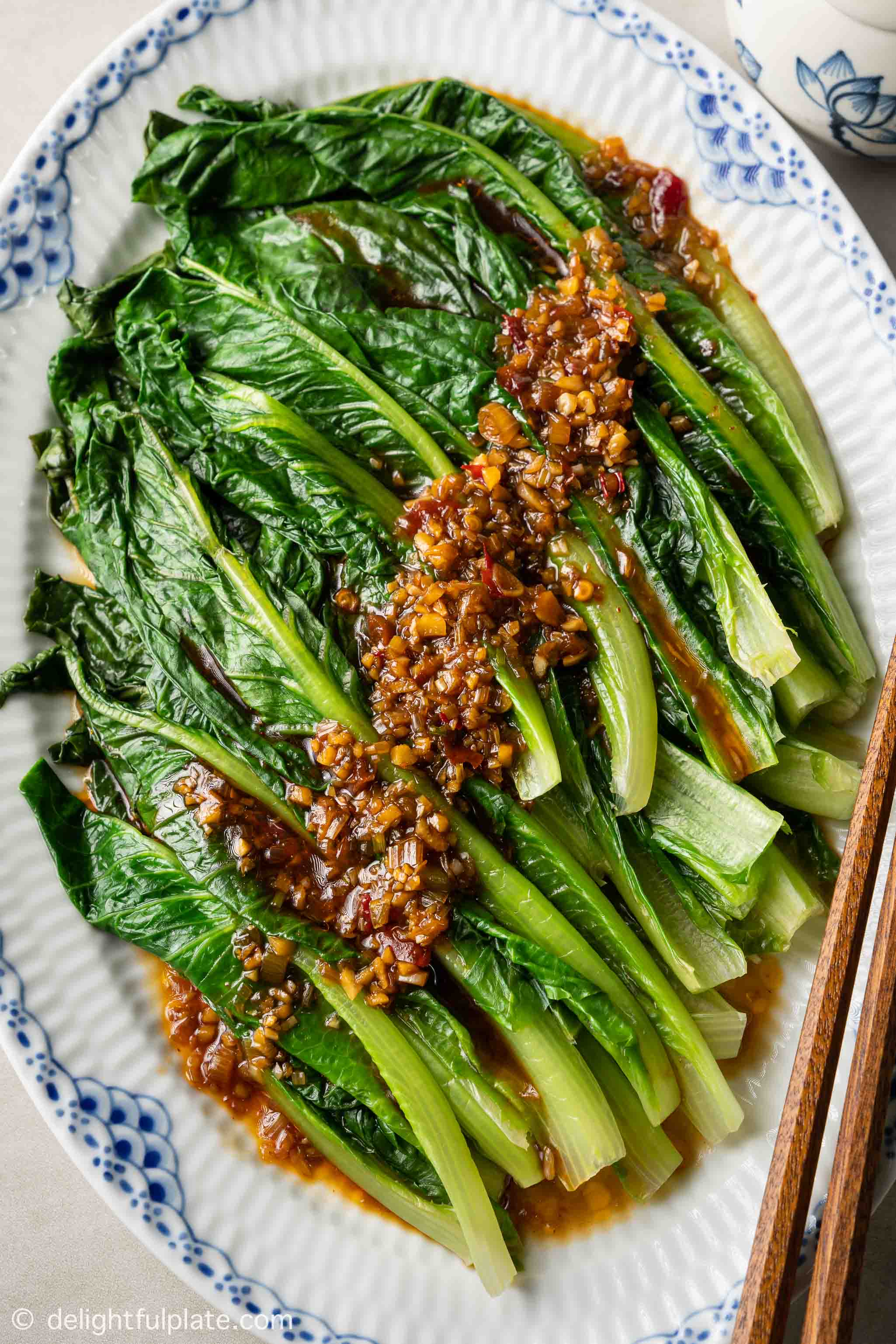 a plate of Chinese romaine with garlic sauce