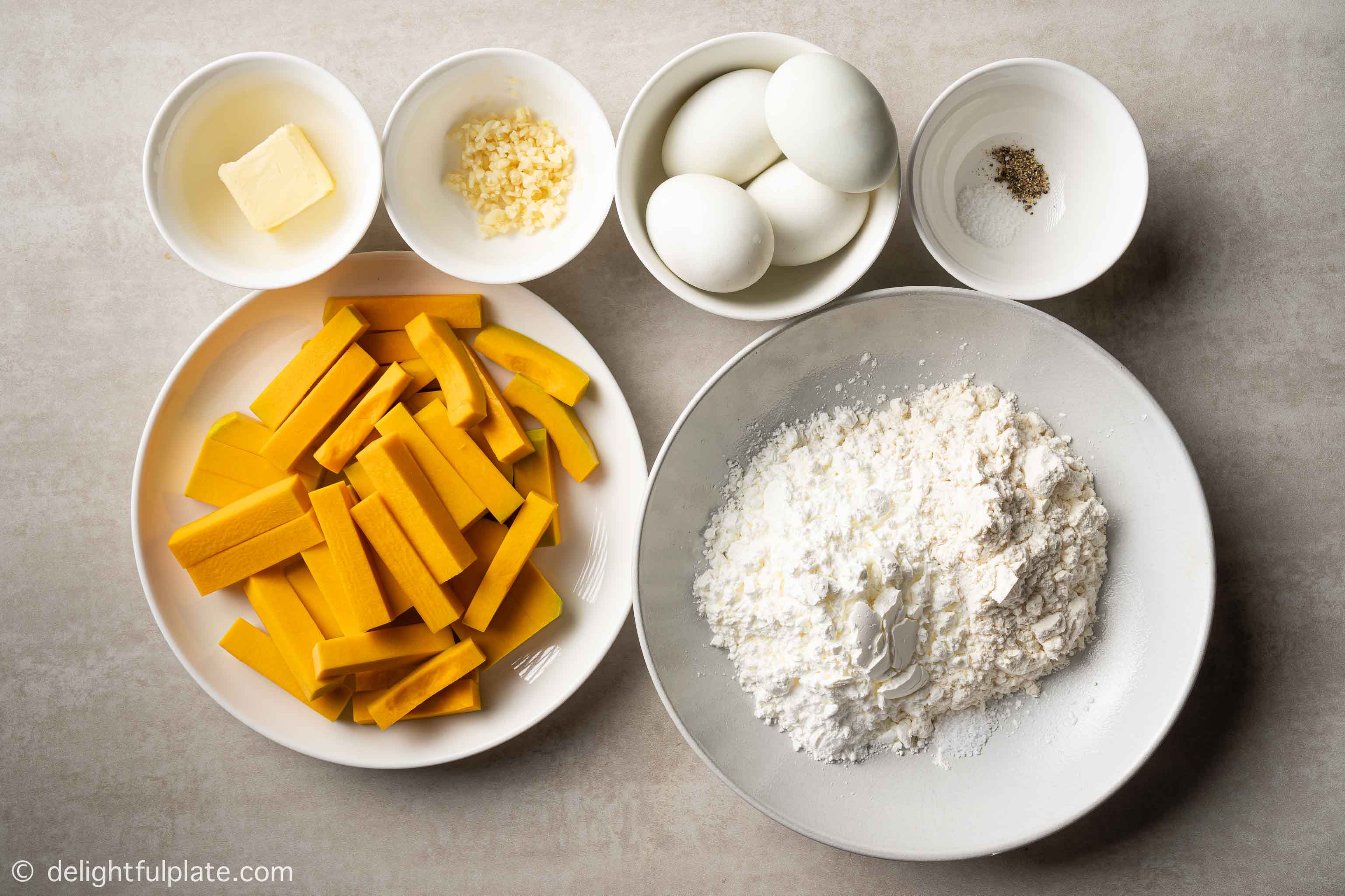 plates and bowls with ingredients for the recipe