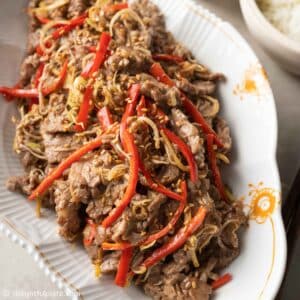 a plate of Vietnamese stir-fried beef with lemongrass