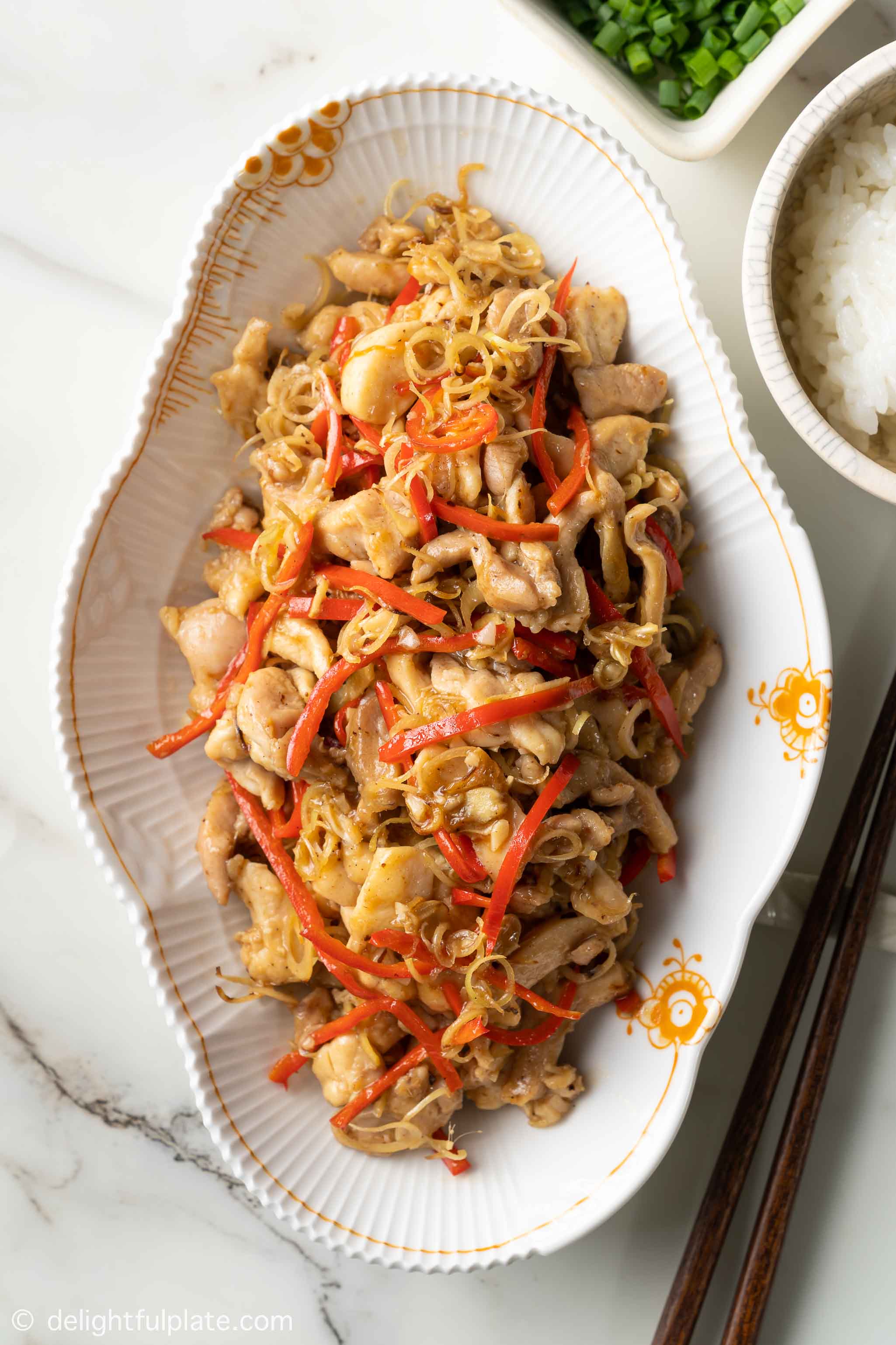 a plate of Vietnamese stir-fried chicken with lemongrass